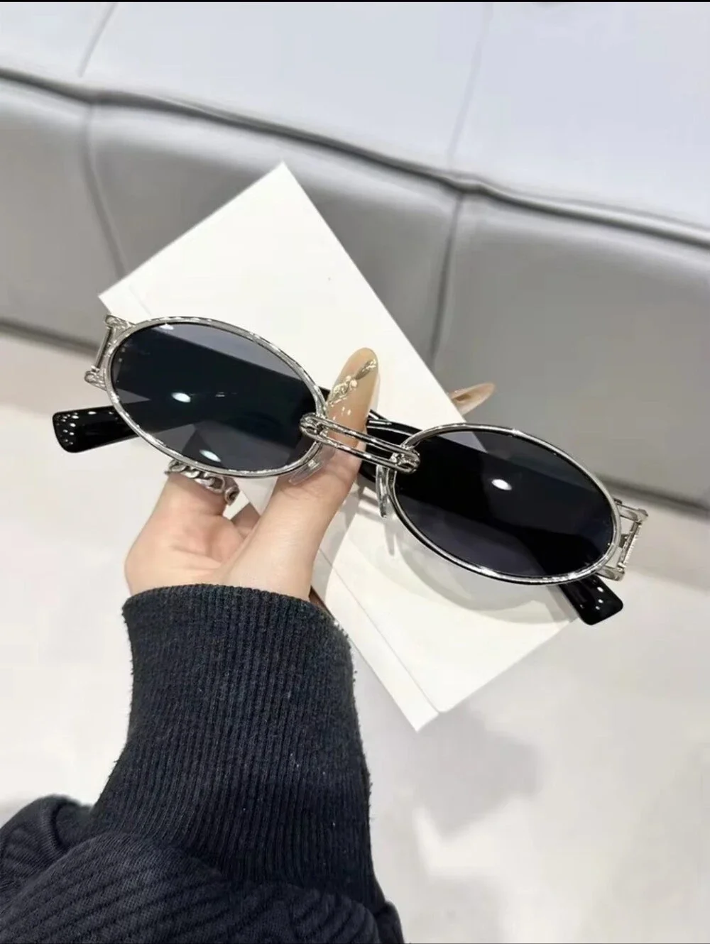 Round Black Sunglasses with Silver Accents